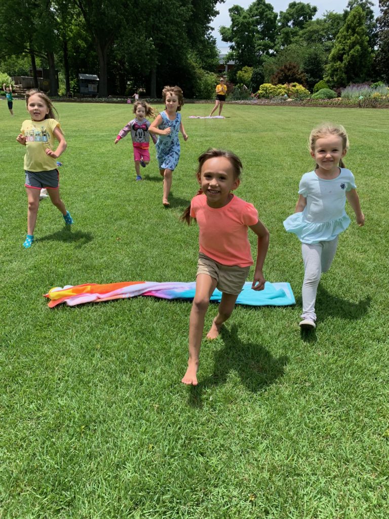 Children running in a field.
