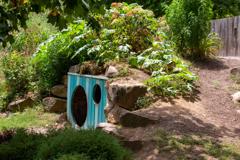 Underground tunnel for children to play in located in the Children's Garden